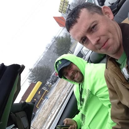 A quick selfie with a buddy on a gray day out.