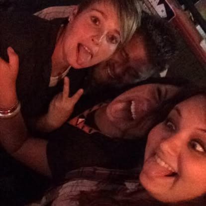 Silly faces and peace signs piled in for a selfie.