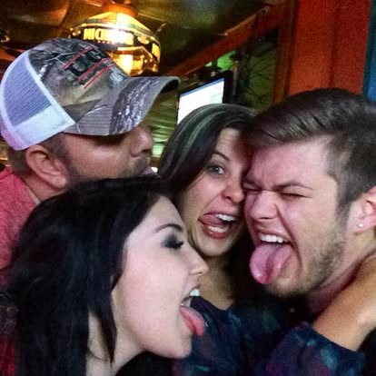 Nate and friends goofing off on a fun night out.