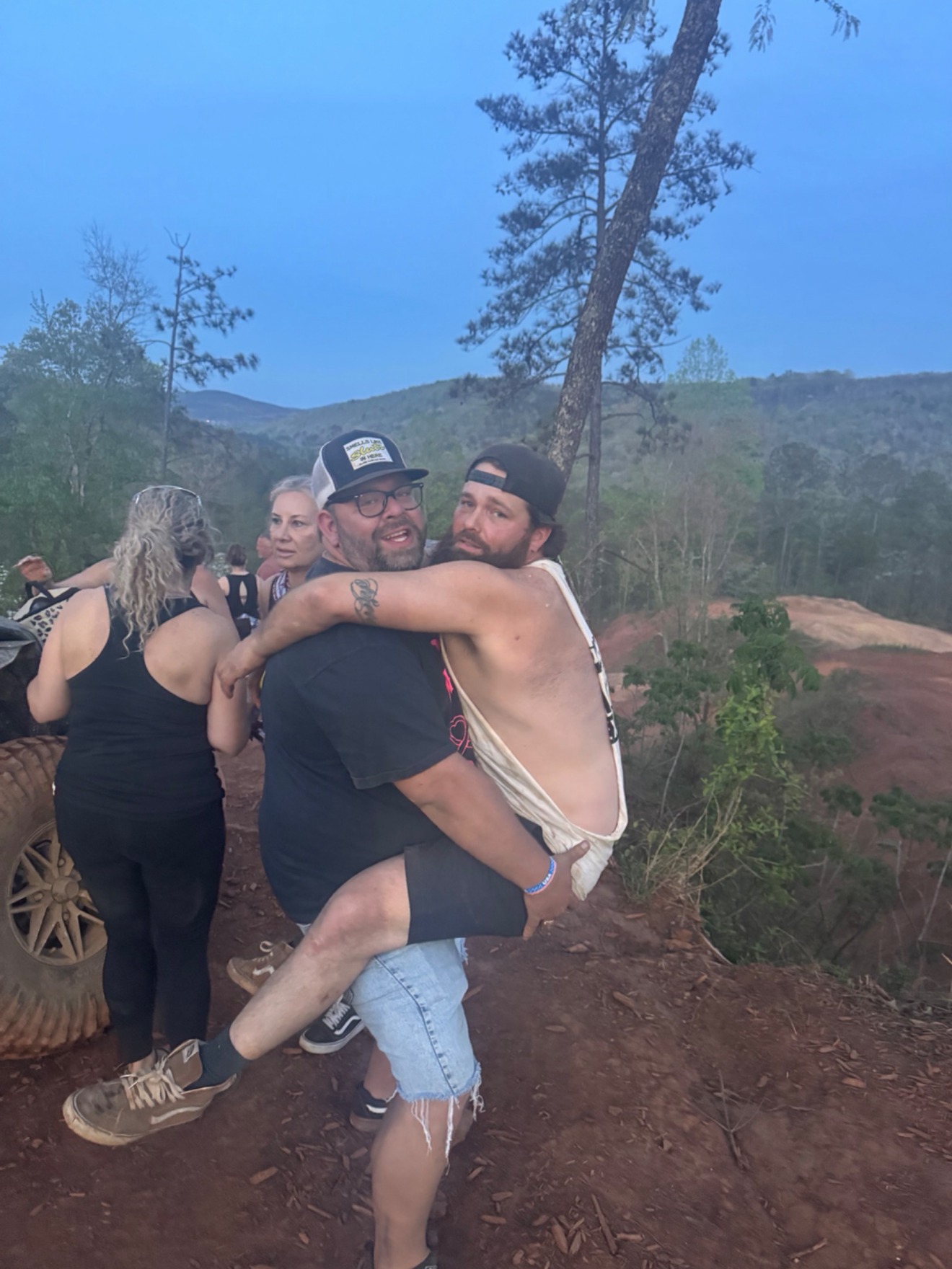 Catching a piggyback ride at the overlook at dusk.