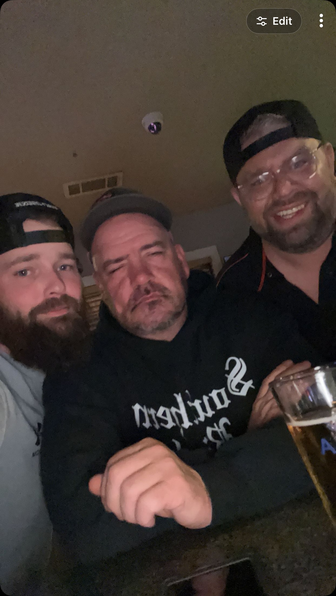 Squeezed in close with the boys for a late-night snap.