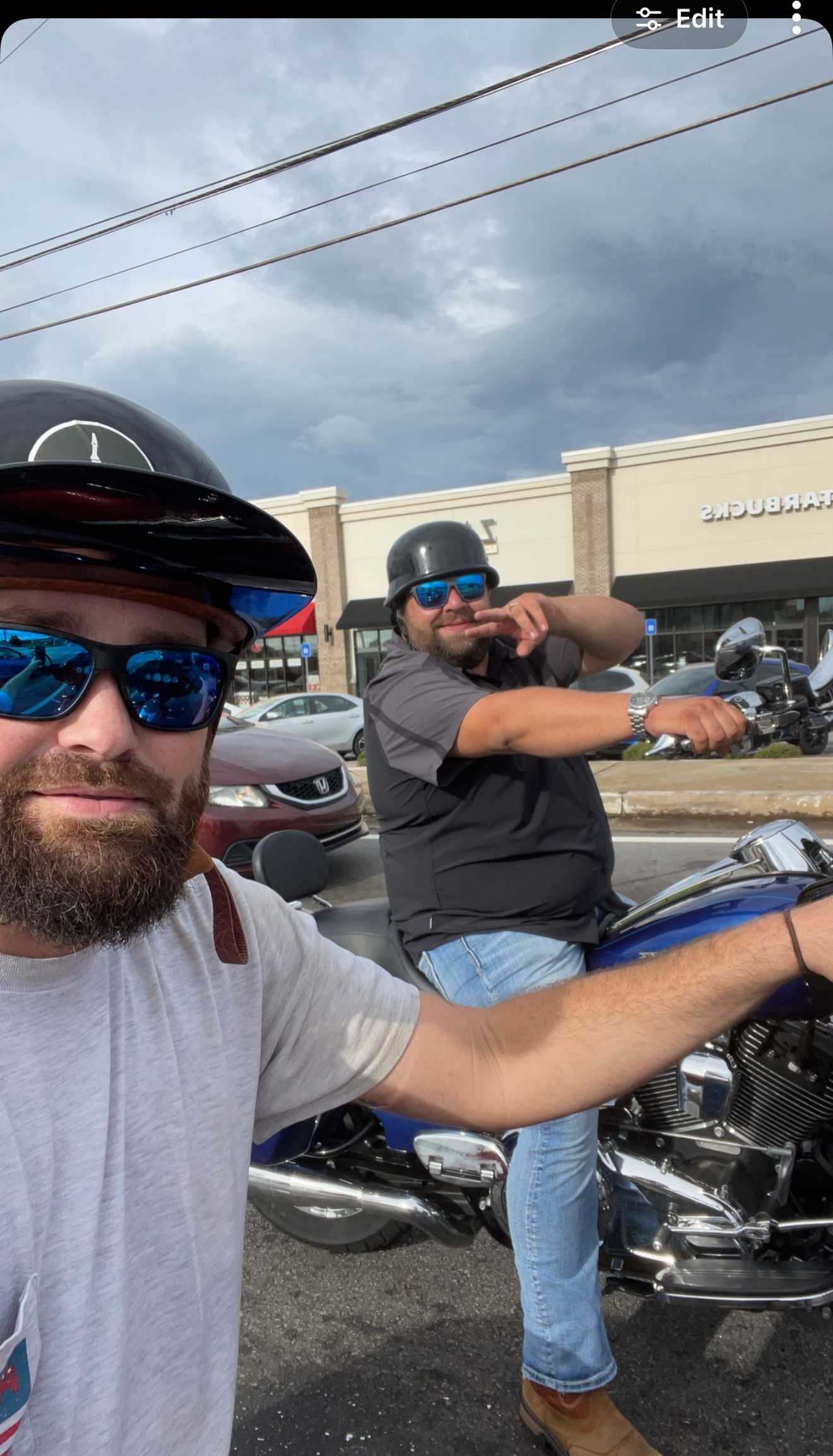 Helmets on, rolling out — Snapchat from a ride with a buddy.